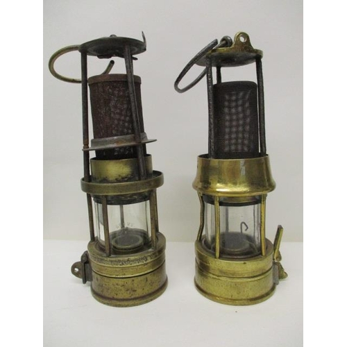 181 - Two Richard Johnson Clapham, Morris steel and brass miners safety lamps, one stamped 878, 9 1/2