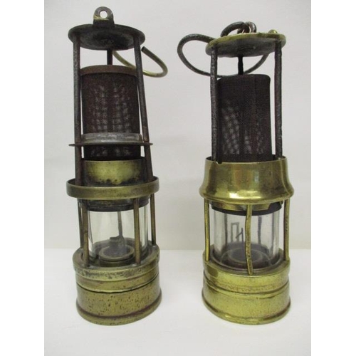 181 - Two Richard Johnson Clapham, Morris steel and brass miners safety lamps, one stamped 878, 9 1/2