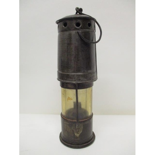 183 - A steel miners drift lamp with a clear glass panel, 9