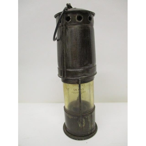 183 - A steel miners drift lamp with a clear glass panel, 9