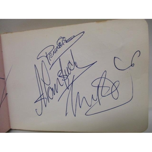 189 - A 1960s autograph book containing the signatures of John Entwistle, Roger Daltrey and possibly Keith... 