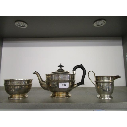 194 - A three piece silver tea set, by Viners Ltd  Sheffield 1930/31, with band decoration, comprising a t... 