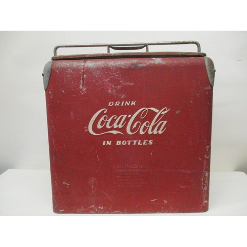 70 - A mid 20th century Action MFG Co red and white painted metal Coca Cola cooler box with a chrome hand... 