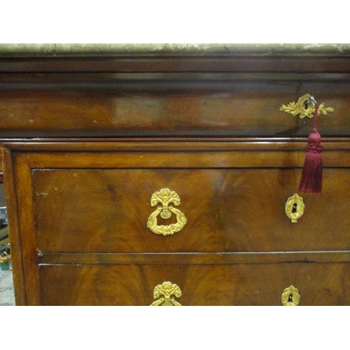 64 - A 19th century French mahogany commode having a marbled top over a cushion moulded drawer and three ... 