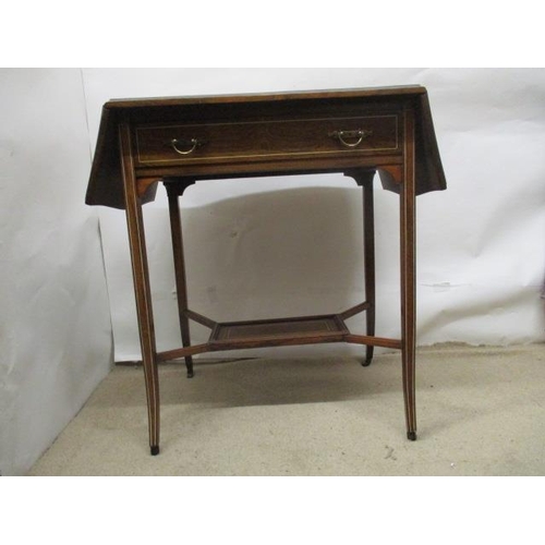 63 - A late Victorian string inlaid, rosewood and marquetry occasional table with twin fall flaps and a d... 