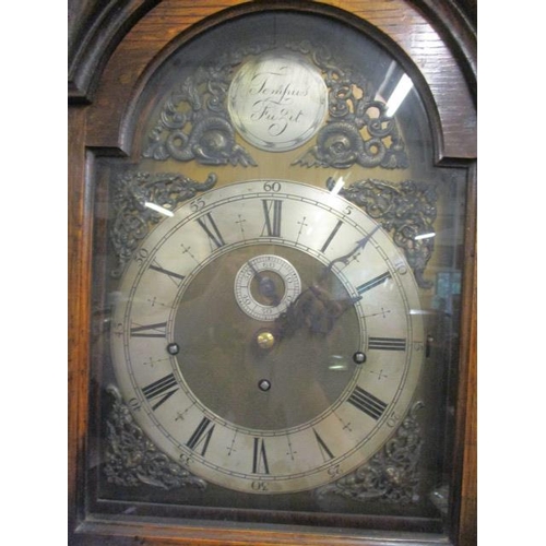 47 - An early 20th century German oak cased 8 day longcase clock, the brass dial having a mottled centre,... 