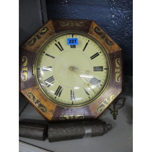 235 - A continental brass inlaid rosewood cased wall clock