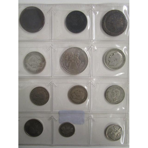 101 - A group of British and foreign coinage to include two cartwheel pennies, a Georgian half penny, Crow... 