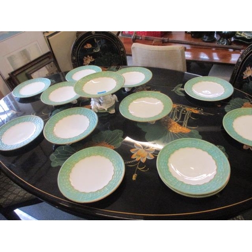 133 - A black chinoiserie dining table with six matching chairs