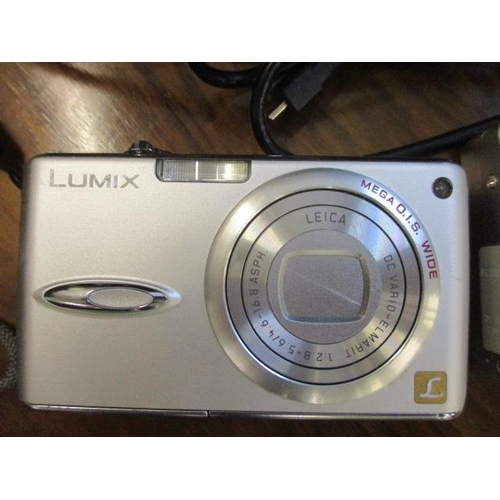 138 - Two cameras to include a Panasonic Lumix