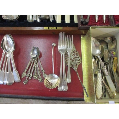 67 - A large quantity of miscellaneous silver plated cutlery and flatware, to include a silver napkin rin... 