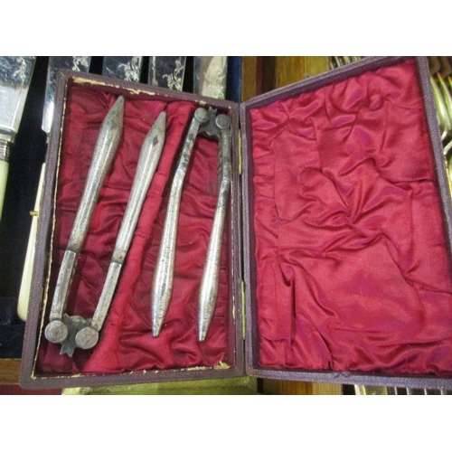 67 - A large quantity of miscellaneous silver plated cutlery and flatware, to include a silver napkin rin... 