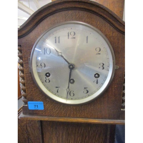 71 - A mid 20th century oak granddaughter longcase clock