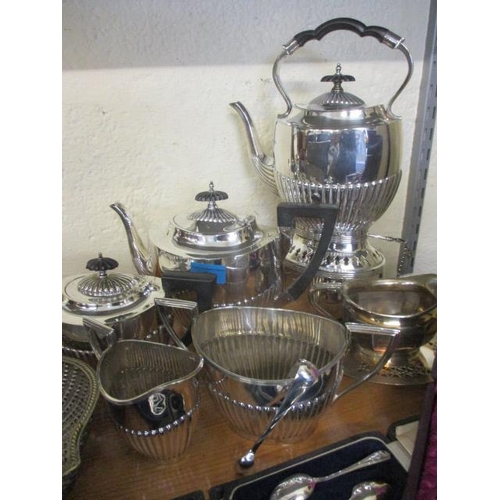 72 - A quantity of silver plate to include a silver plated teaset and boxed cutlery