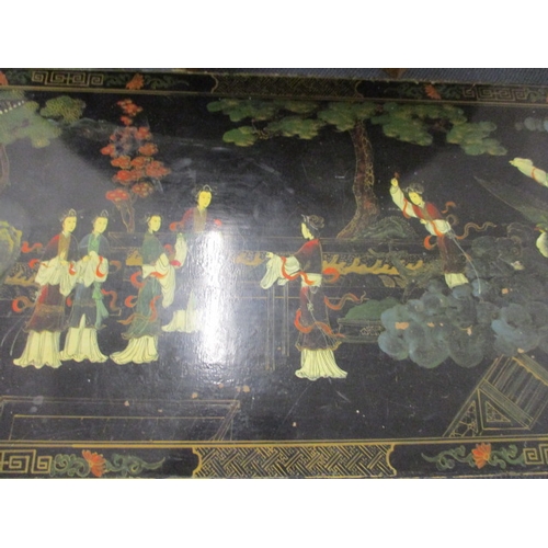 119 - An Oriental three drawer coffee table with japanned decoration on square tapering legs with spade fe... 