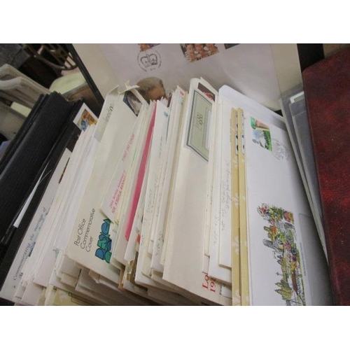 257 - First Day Covers, loose stamps, loose album pages, stamps on a card, a quantity of mint GB Sterling ... 