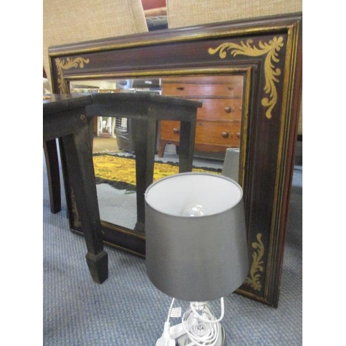 185 - A padouk and cane stool with spayed feet, together with an inlaid mirror and a modern lamp