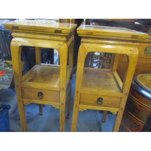 243 - A pair of Chinese oak and elm side stands with lower tier and single drawers 34