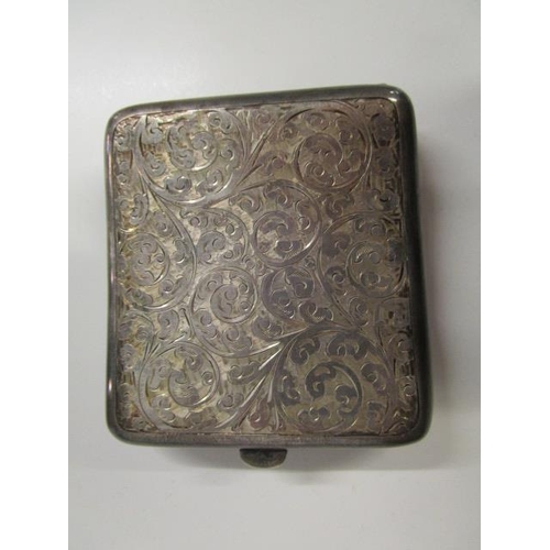 315 - An Edwardian silver cigarette case with floral scrolled decoration, Birmingham 1919, marks for Dingl... 