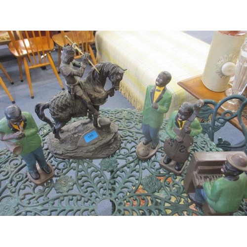 195 - A painted plaster band and a model of a knight on horseback