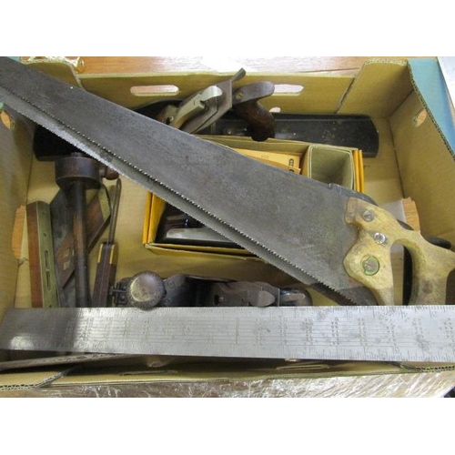 206 - A group of woodworking tools to include three Stanley planes, a metal square and other items