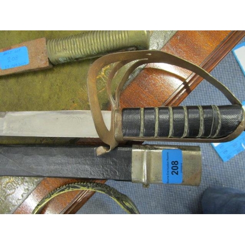 208 - An Indian curved sword with engraved blade, blade 30