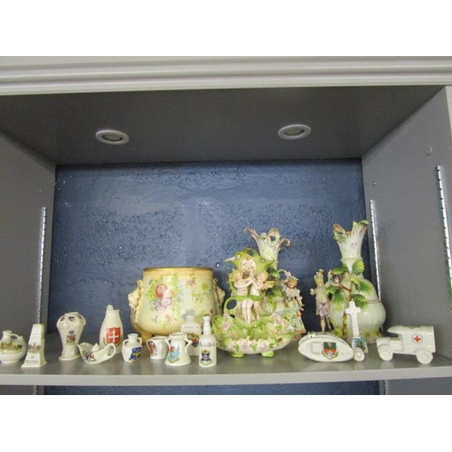 221 - Crested china to include a model of a World War 1 tank, a military vehicle and other ceramics