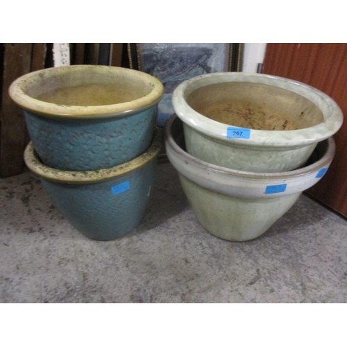 267 - Four glazed garden pots, largest 11