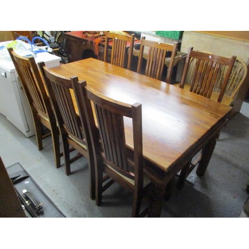 278 - A modern teak dining table together with six matching chairs 30