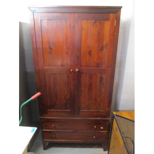 283 - A modern pine wardrobe 75 3/4