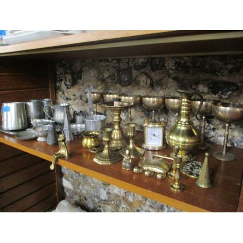 291 - Metalware to include tankards, a pewter tray, candlesticks and other items