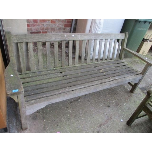 295 - A large teak garden bench 32