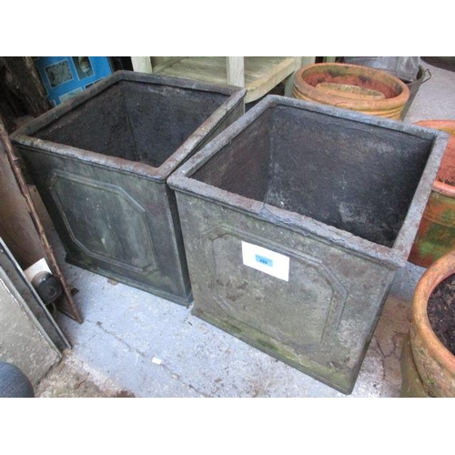 299 - A pair of fibreglass garden planters 18