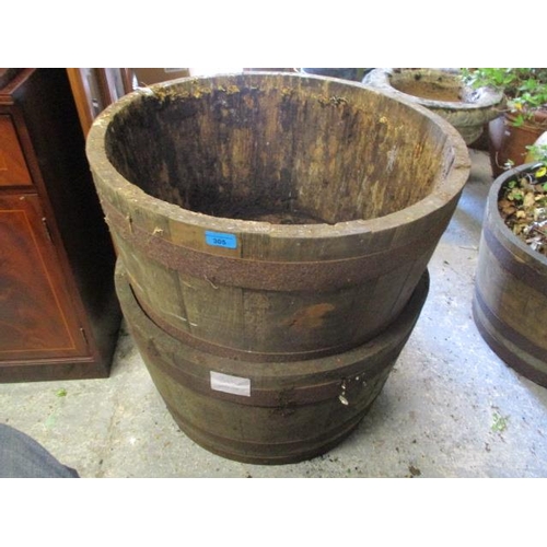 305 - A pair of teak and metal support large garden planters