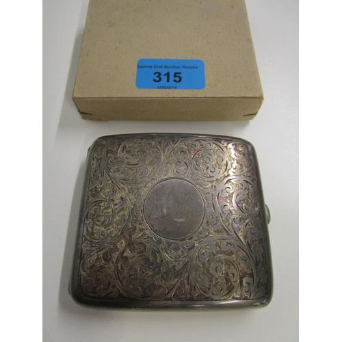 315 - An Edwardian silver cigarette case with floral scrolled decoration, Birmingham 1919, marks for Dingl... 