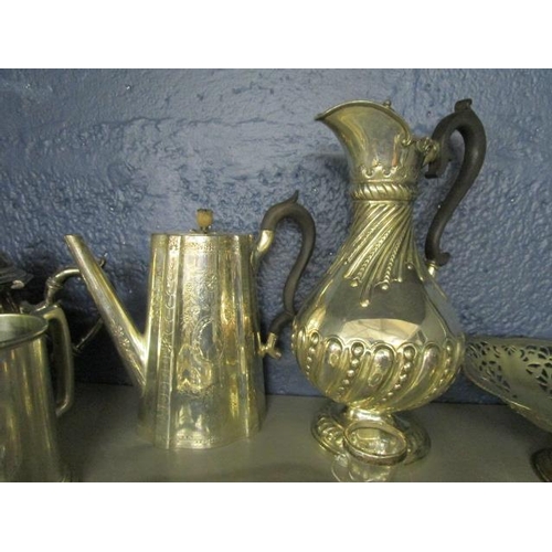 326 - Silver and silver plate to include a claret jug, a teapot, a coffee pot, a silver bracelet, a silver... 