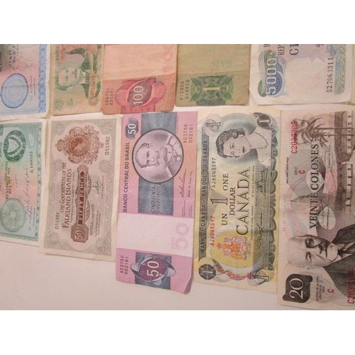 332 - A group of British and foreign banknotes to include a J S Forde ten-shilling note, a Falkland Island... 