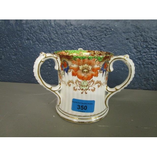 350 - An Edwardian English pottery tyg with fluted moulded decoration to the waisted body, with three ear ... 