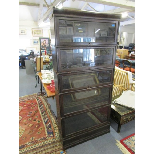 351 - An early 20th century dark oak Globe Wernicke Co Ltd bookcase with five sections on a base