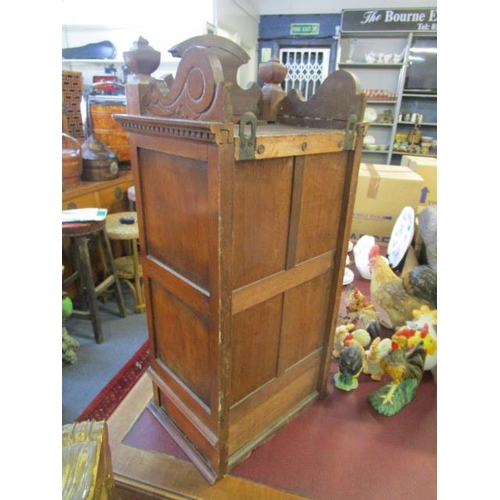 352 - A late Victorian/Edwardian table display cabinet with carved pediment, flanked by turned finials, ab... 