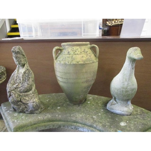 359 - Weathered composition stone garden ornaments and pots to include a model duck, an Oriental figure, a... 