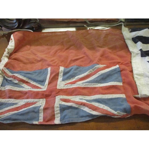 391 - A selection of vintage cloth flags A/F to include two German flags retailed by Captain O M Watts Ltd... 