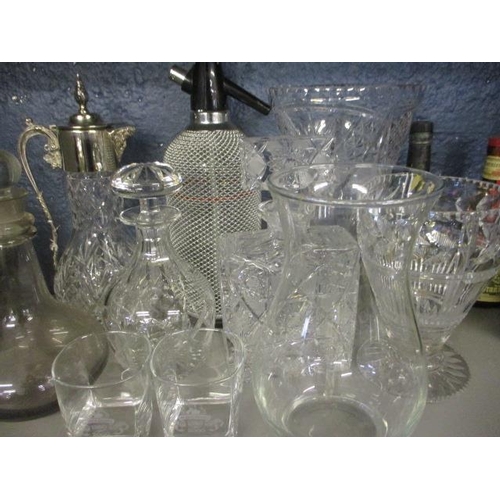 419 - A claret jug with silver plated top, mixed cut glass decanters, smoky glassware, mixed glass and emp... 