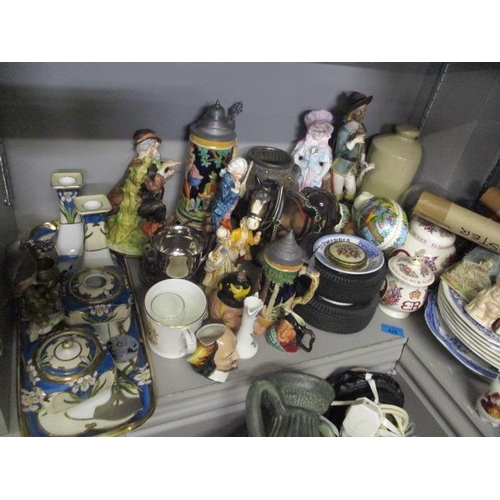 428 - A mixed lot to include Noritake dressing table set, a German tankard, a large blue and white platter... 