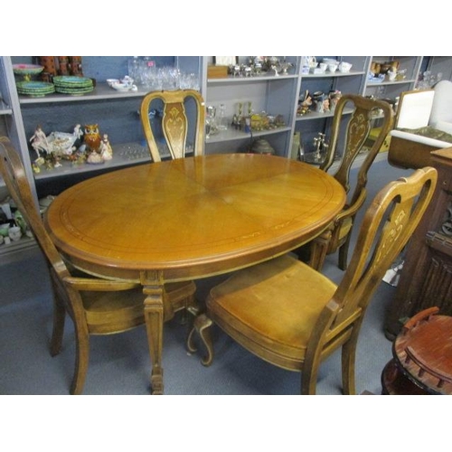 495 - An 'American of Martinsville' dining table with painted decoration and six matching chairs