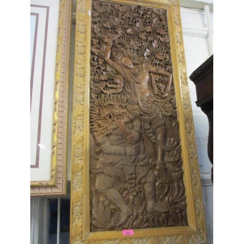 162 - An Indonesian carved hardwood panel, 42