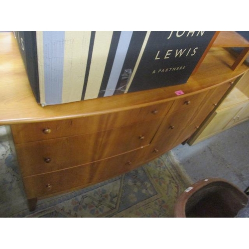 185 - A modern bow fronted sideboard having six short drawers and tapering legs 30 1/2