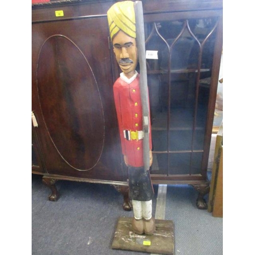 153 - A reproduction carved figure of an 1880s Bombay Native Infantry man, 45