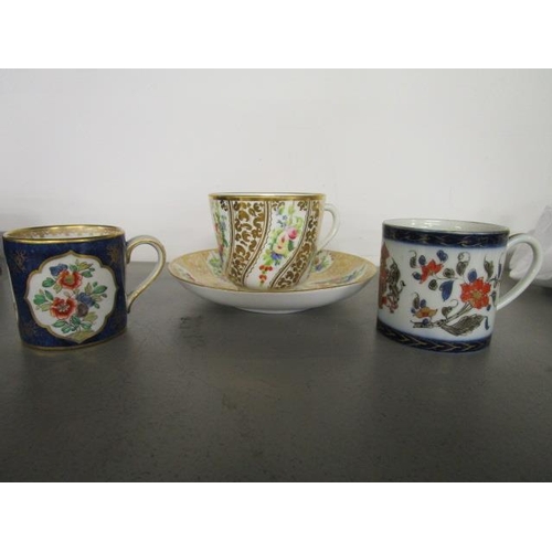 414 - A Victorian English porcelain tea cup and saucer, a hard paste Samson style coffee cup, and an Engli... 