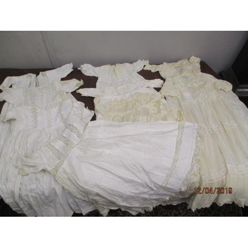 200 - Victorian and later childrens' silk and cotton clothing with lace detailing (10)